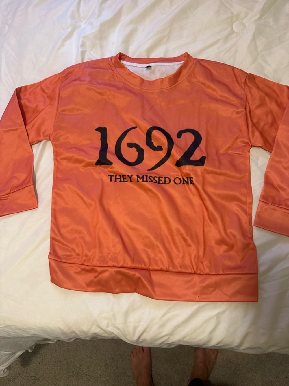 Orange Graphic Pullover Sweatshirt with '1692 They Missed One'
